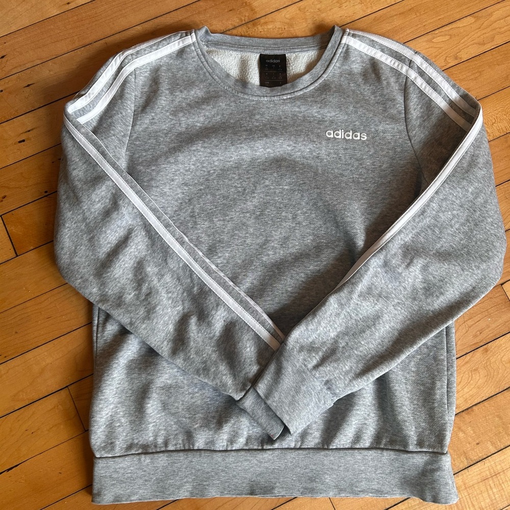 A1. Adidas Gray Women’s Sweater. Matching Pants Sold Separately.